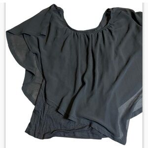 Dusty Rose beautiful black blouse size small
New with Tag